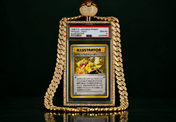 Gold-plated pendant necklace featuring a framed Pikachu Illustrator card on a dark background with a diamond-studded chain.